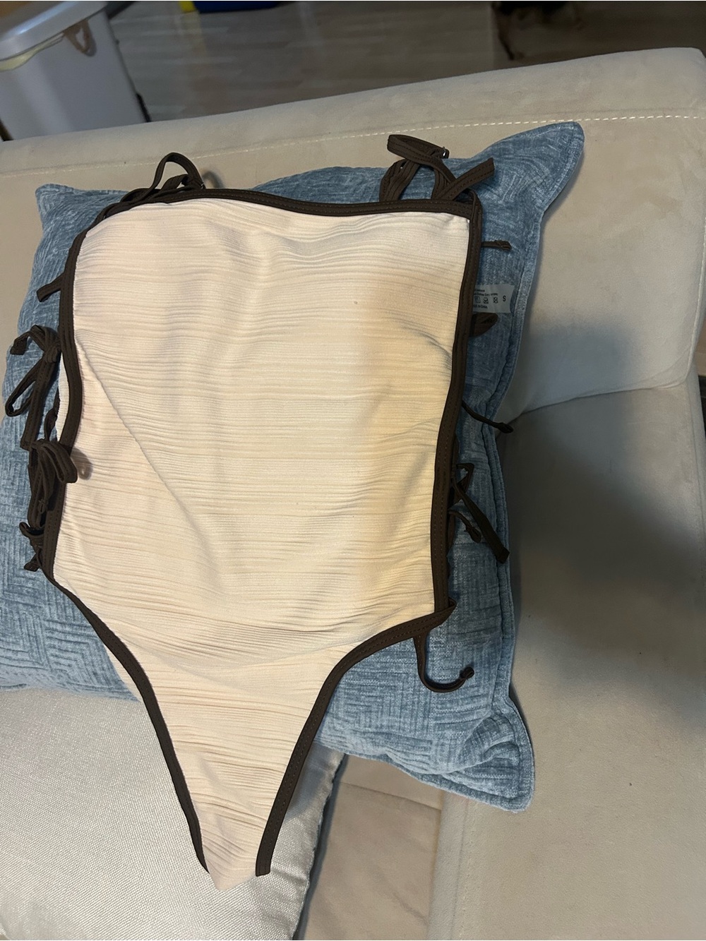 Cream One-Piece Swimsuit with Brown Trim